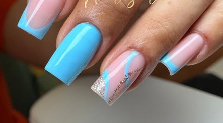 Vibrant blue and pink nail art at Uxua’s Nail Salon, Clifton, New Jersey, US.