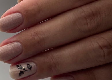 Elegant nail art with a leaf design at DK Nail Aesthetician, Sutton, England, GB.