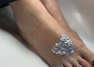 Elegant glittering pedicure at DK Nail Aesthetician, Sutton, England, GB for a stylish finish to your look.