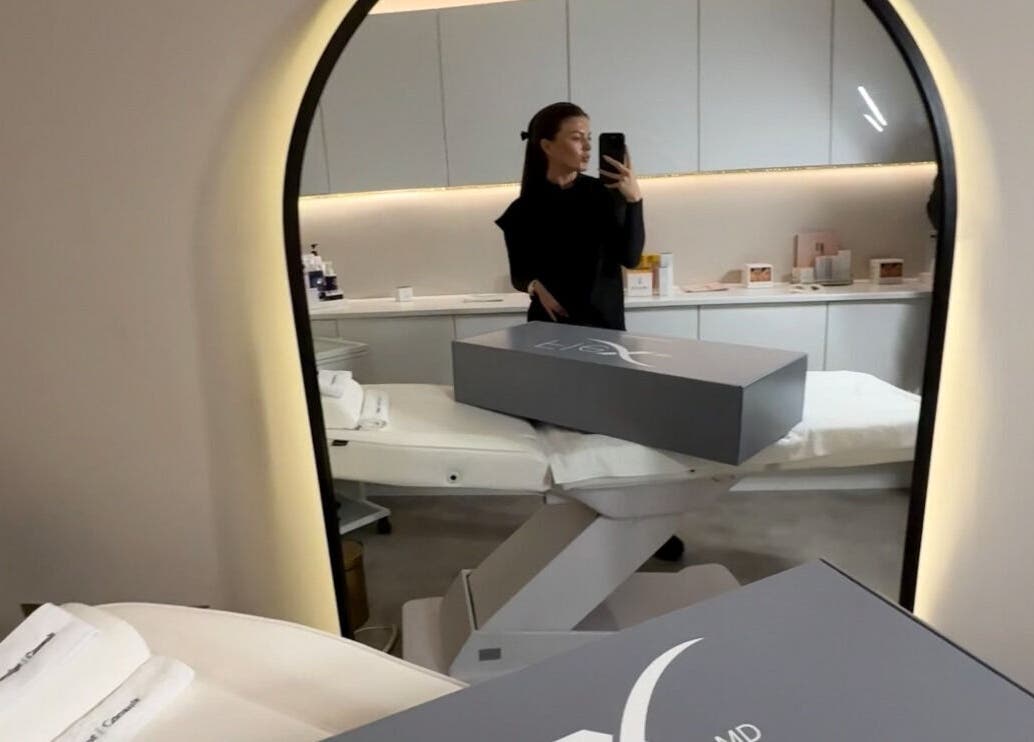 Modern interior of The Skin Sculpt Consult, Southport, England, GB with treatment bed and products.