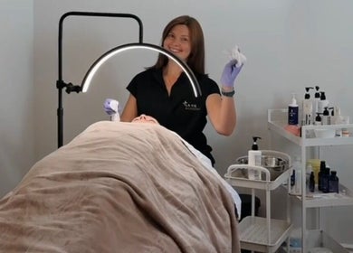 Facial treatment at Elena Danileiko Spa in Kelowna, British Columbia, CA, showcasing a serene and professional setting.