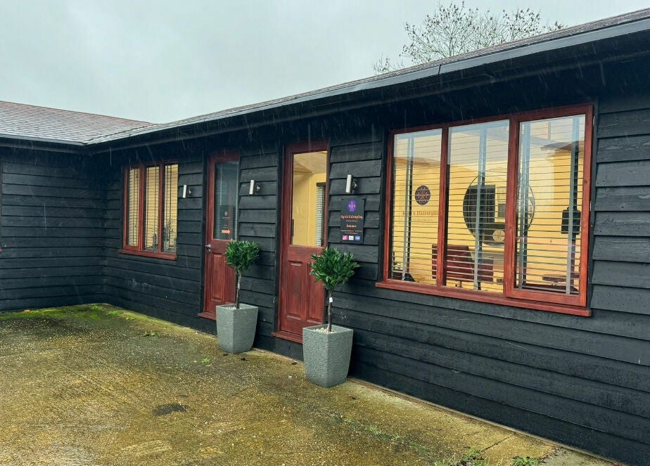 Exterior of Kym's Hairstyling on Gaddesden Row, England, GB, showcasing a welcoming salon entrance.