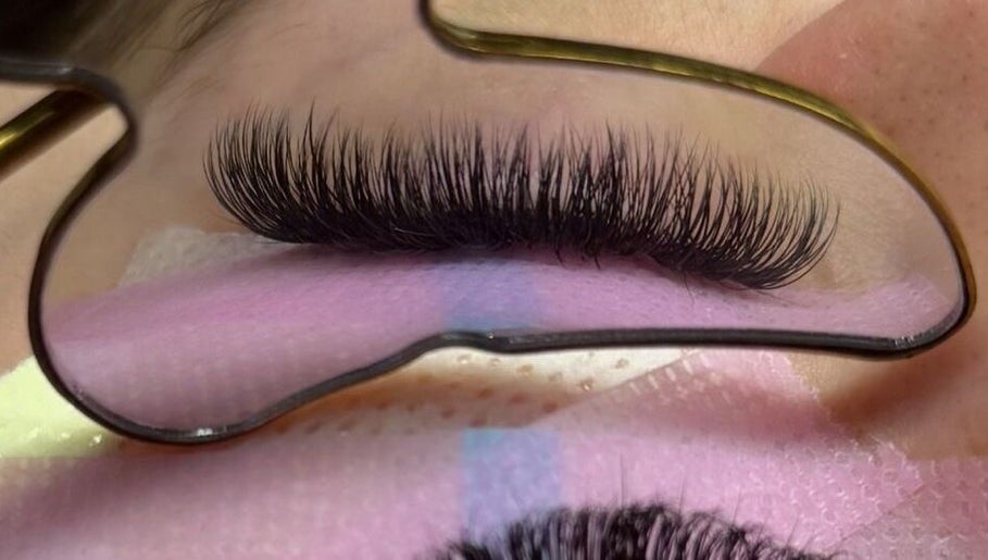 Eyelash extensions at The Hatters Beauty Room in Finedon, England, GB. Lashes highlighted in close-up view.