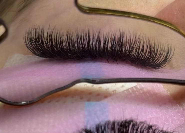 Eyelash extensions at The Hatters Beauty Room, Finedon, England, GB. A close-up of lush black lashes.