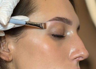 Precision eyebrow shaping at LUMIÁ BEAUTY CHELSEA in London, England, GB, highlighting expert beauty services.