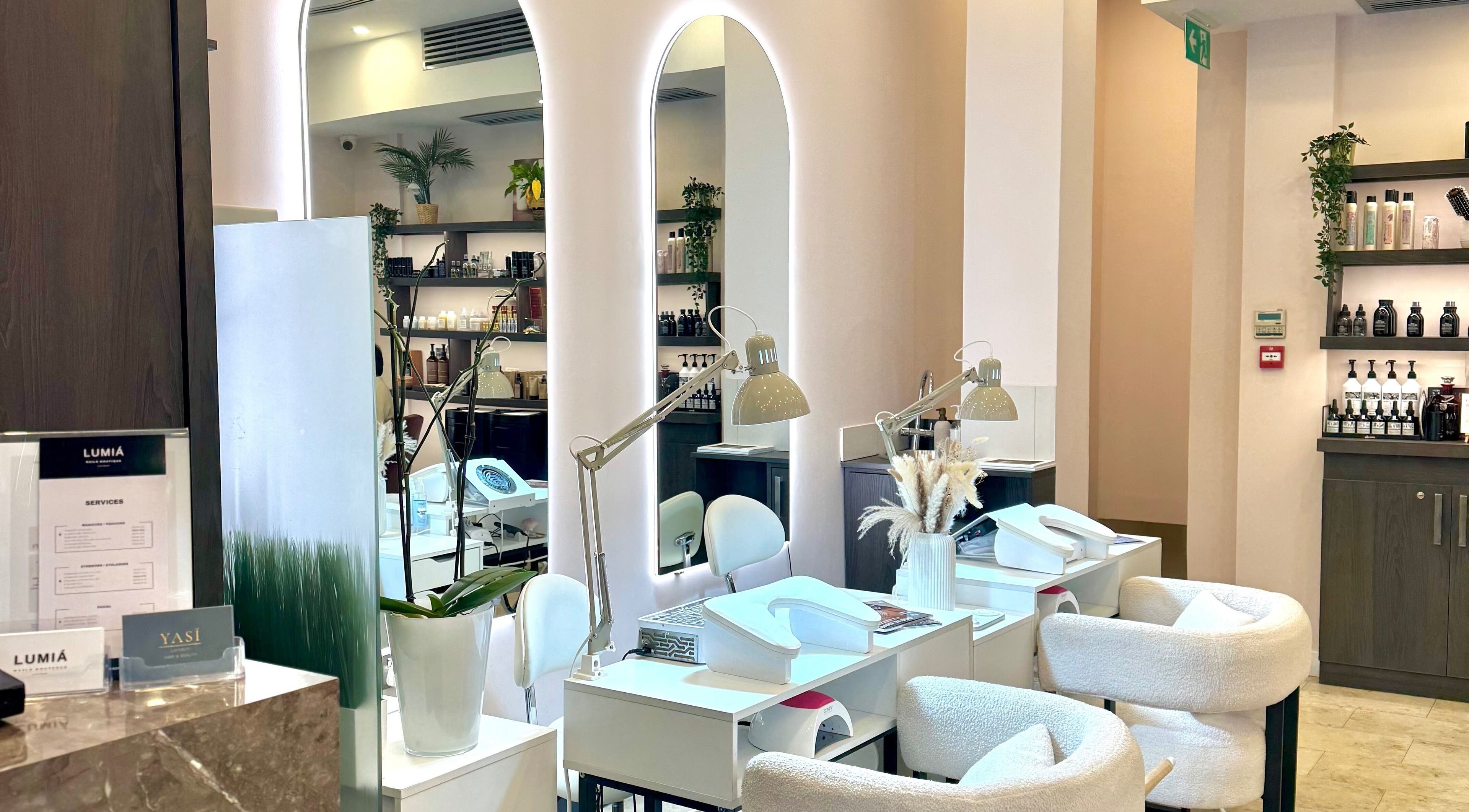 Stylish interior of LUMIÁ BEAUTY CHELSEA nail station in London, England, GB with elegant decor and equipment.