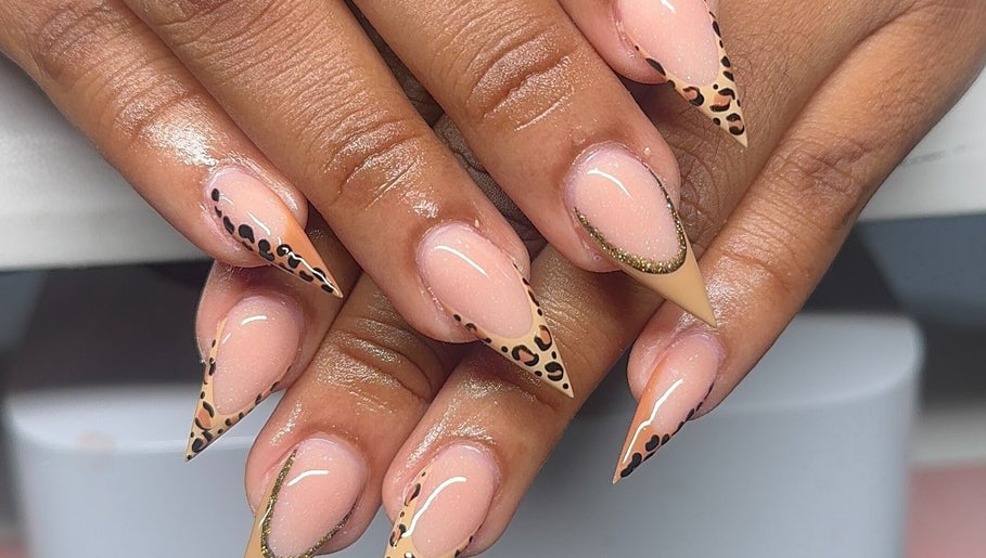 Stylish leopard print and shimmering nails at The Beauty Bar By Sav & Co, Philipsburg, SX.