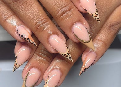 Stylish leopard print and shimmering nails at The Beauty Bar By Sav & Co, Philipsburg, SX.