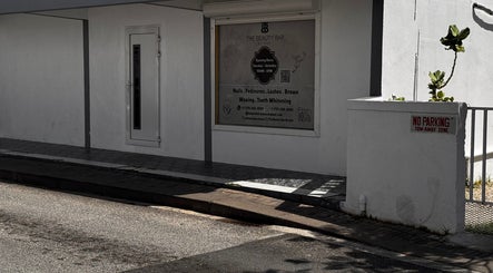 Exterior view of The Beauty Bar By Sav & Co at Philipsburg, SX, showcasing service offerings and entrance.