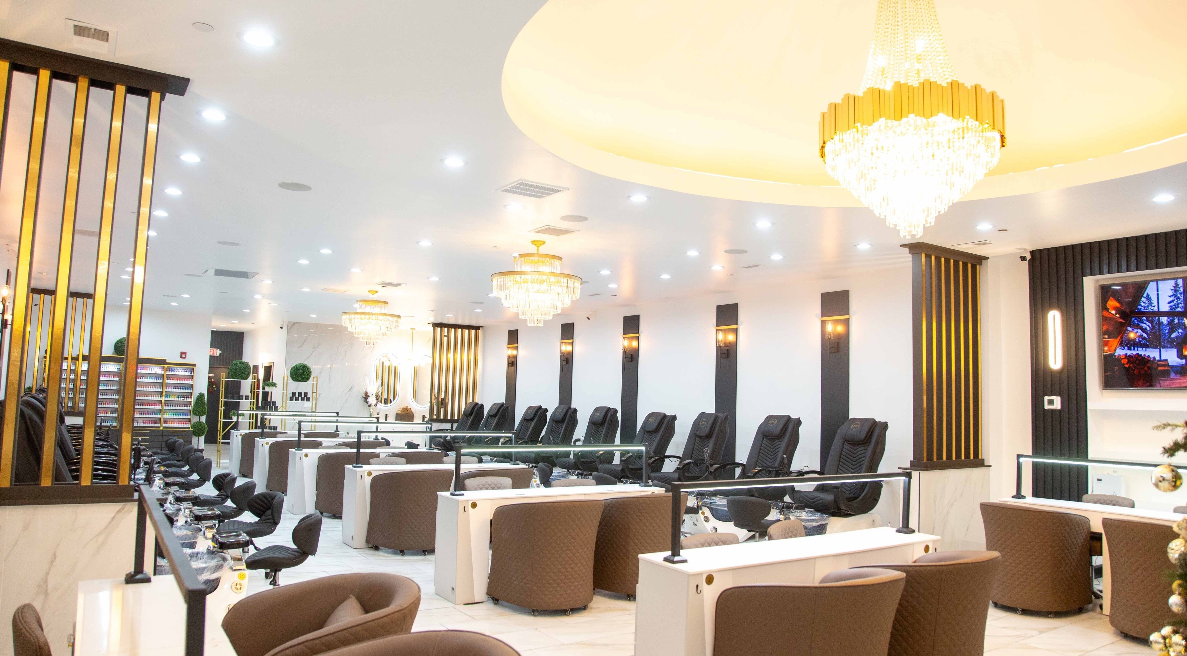 Elegant Coco Nail Bar in Crystal Lake, IL, US showcasing plush seating and chandeliers for ultimate relaxation.