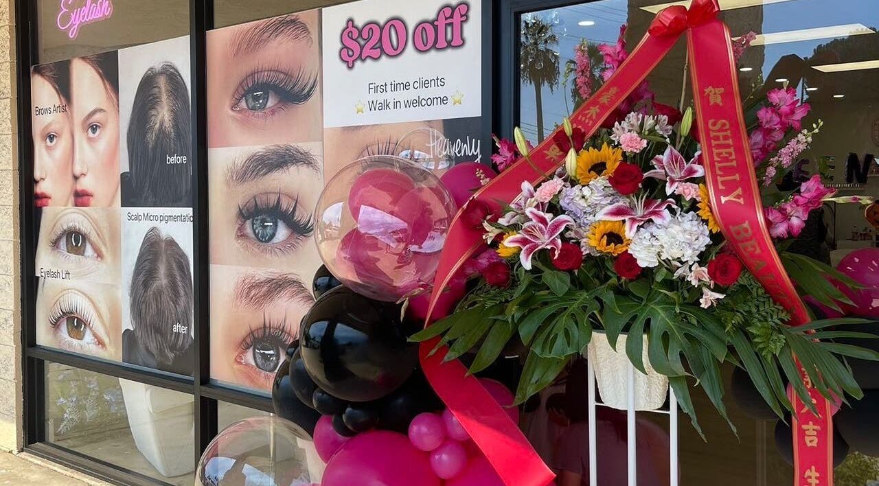 Shelly Beauty Studio entrance in Monrovia, California, with vibrant floral decor and service posters.