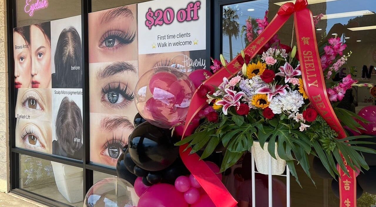 Shelly Beauty Studio entrance in Monrovia, California, with vibrant floral decor and service posters.