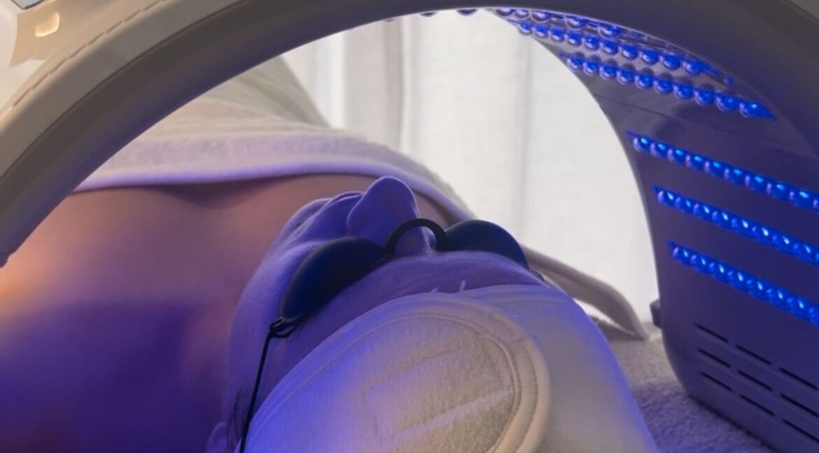Client receiving LED light therapy at Resolve Skin in Beaudesert, Queensland, AU.