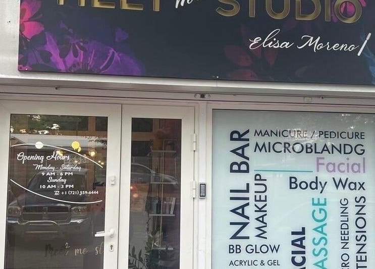 Entrance of Meet Me Studio in Cole Bay, Dutch Sint Maarten featuring services like nail bar and facial.