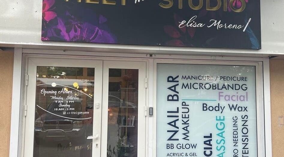 Entrance of Meet Me Studio in Cole Bay, Dutch Sint Maarten featuring services like nail bar and facial.