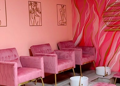 BBA MEDICAL AESTHETICS & BODY CONTOURING LTD CHAGUANAS offers a chic pink waiting area in Chaguanas, Chaguanas, TT.