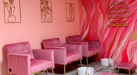 BBA MEDICAL AESTHETICS & BODY CONTOURING LTD CHAGUANAS offers a chic pink waiting area in Chaguanas, Chaguanas, TT.