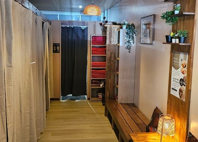 Cozy entrance of Piyawat Thai Massage Maylands, Western Australia, AU with warm lighting and plants.