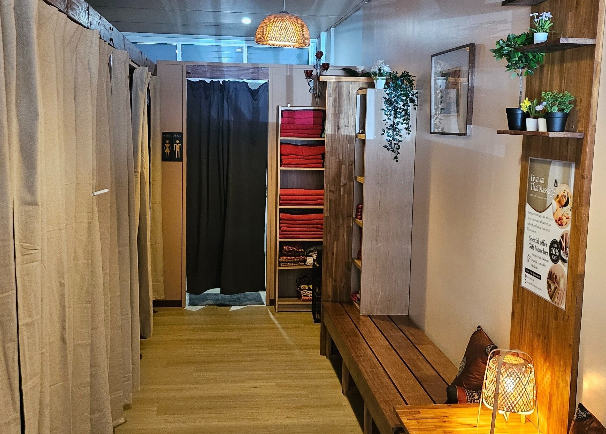 Cozy entrance of Piyawat Thai Massage Maylands, Western Australia, AU with warm lighting and plants.