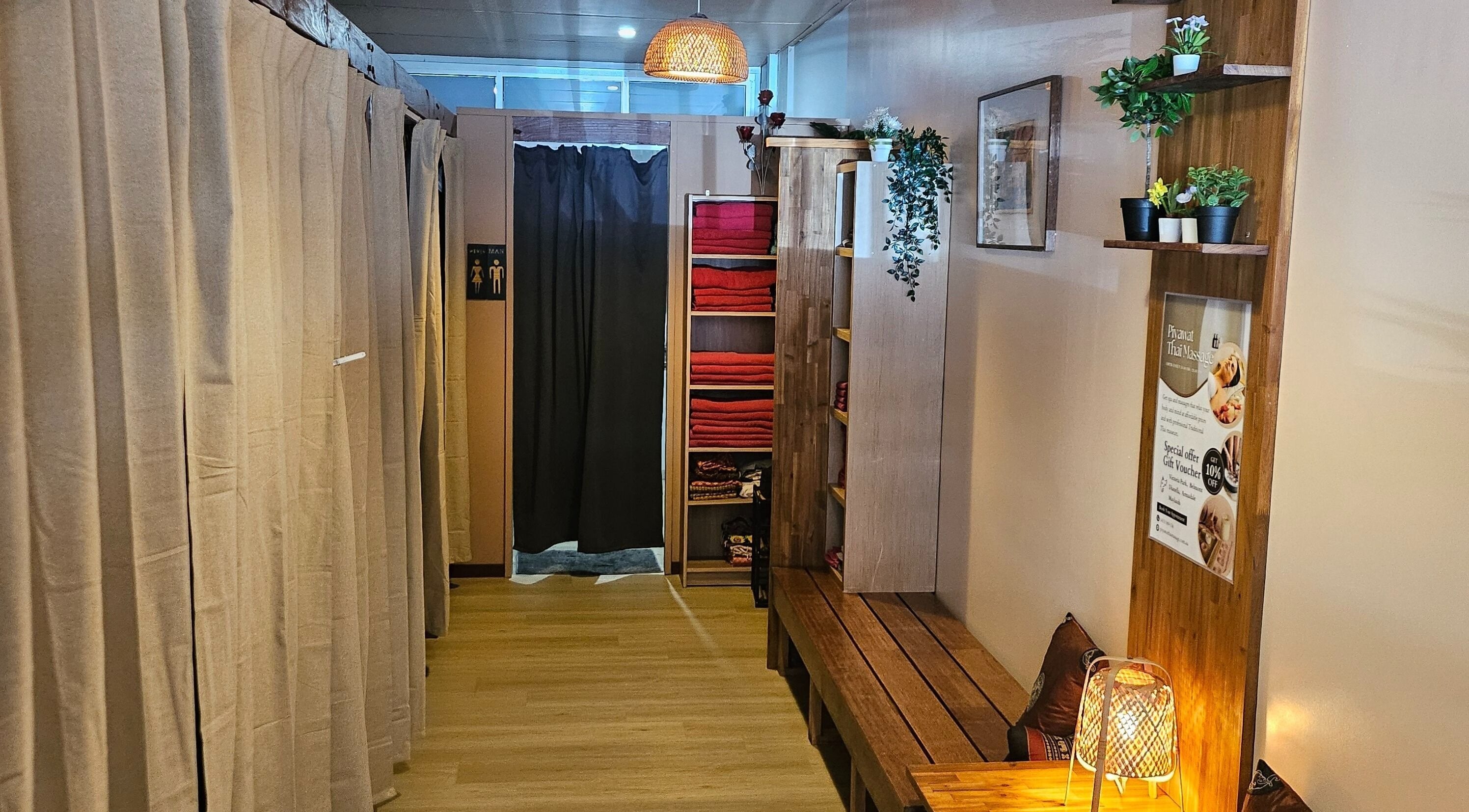 Cozy entrance of Piyawat Thai Massage Maylands, Western Australia, AU with warm lighting and plants.