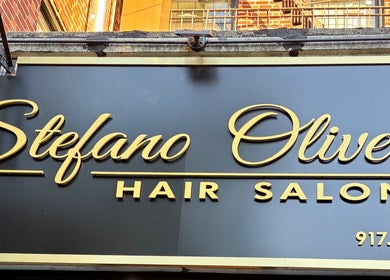 Elegant signage of Jason Mönet Hair at Stefano Oliveri Salon in New York, New York, US.