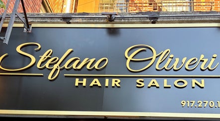 Elegant signage of Jason Mönet Hair at Stefano Oliveri Salon in New York, New York, US.