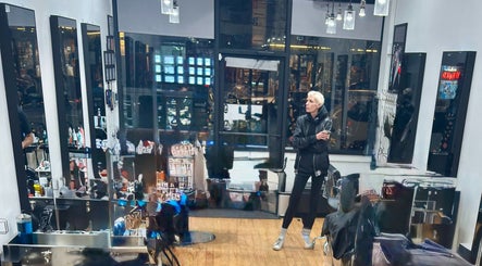 Inside Jason Mönet Hair at Stefano Oliveri Salon in New York. Modern decor and cozy atmosphere.