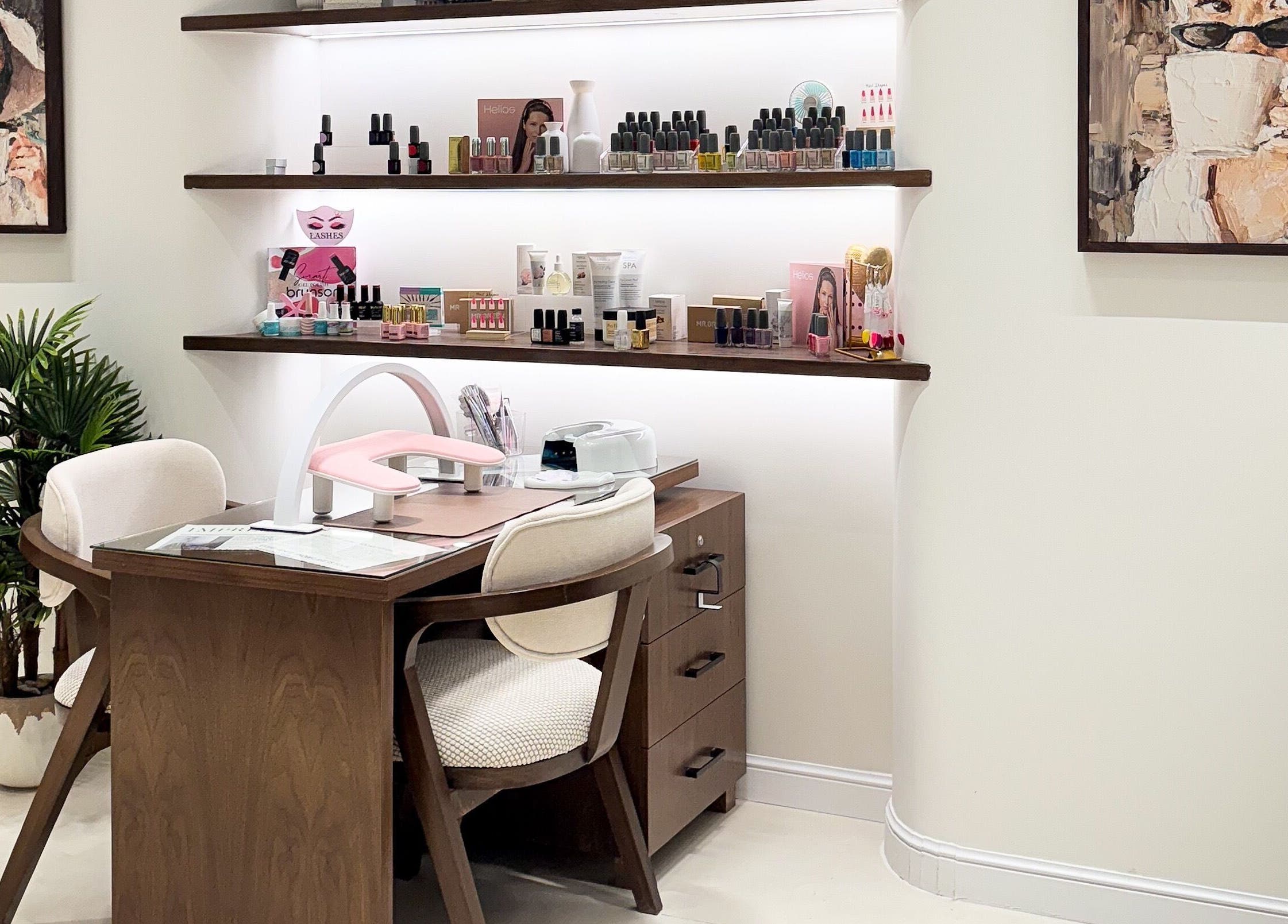 Sophisticated nail station at Gee Salon, Riyadh, Riyadh Province, SA, with polishes and decor.