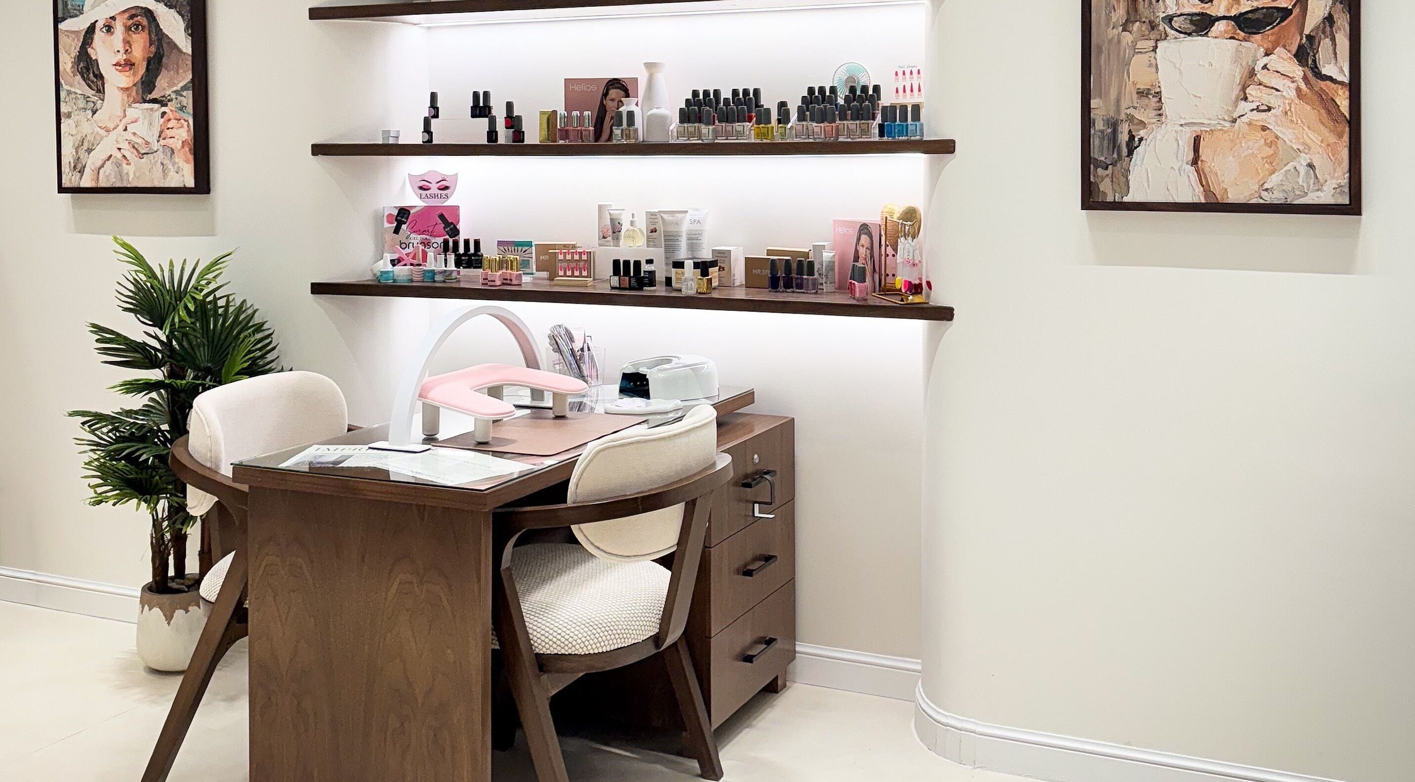 Sophisticated nail station at Gee Salon, Riyadh, Riyadh Province, SA, with polishes and decor.