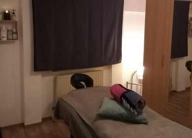 Massage room at Tommy's Massage Zirndorf, with cozy decor in Zirndorf, Bayern, DE.