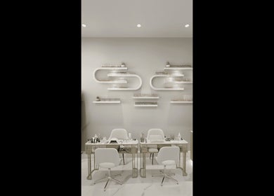 Chic nail service area at Beauty Essentials, Edinburgh, Scotland, GB with modern decor and seating.