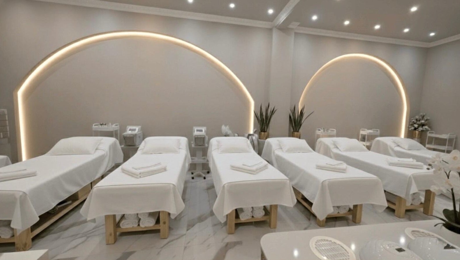 Tranquil treatment room with six spa beds at Beauty Essentials, Edinburgh, Scotland, GB.