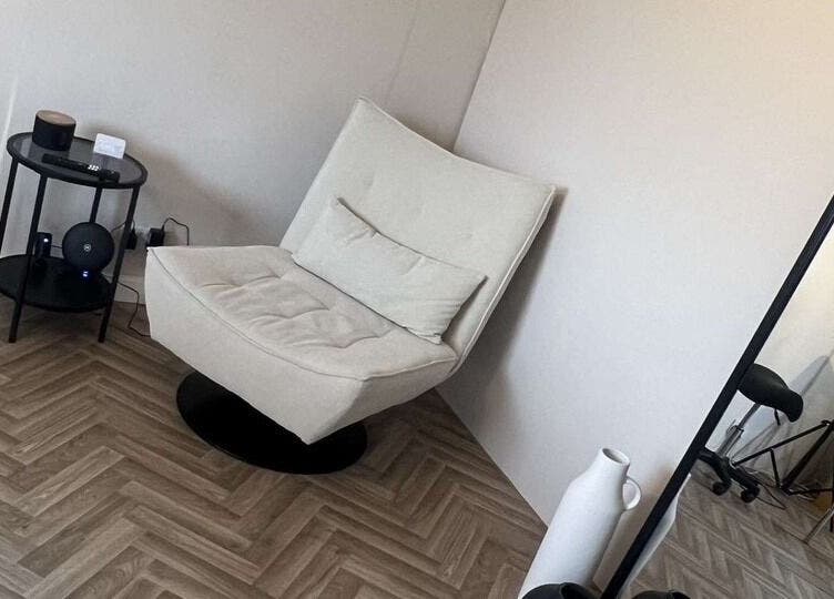 Elegant seating area at BooBeauty, Leighton Buzzard, GB featuring a plush chair and modern decor.