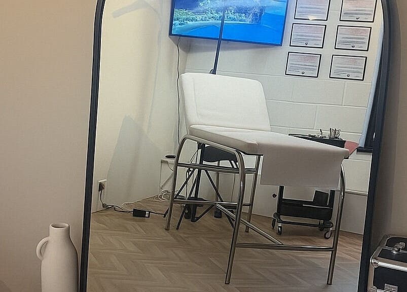 Modern treatment room at BooBeauty, Leighton Buzzard, GB with a comfortable bed and elegant decor.