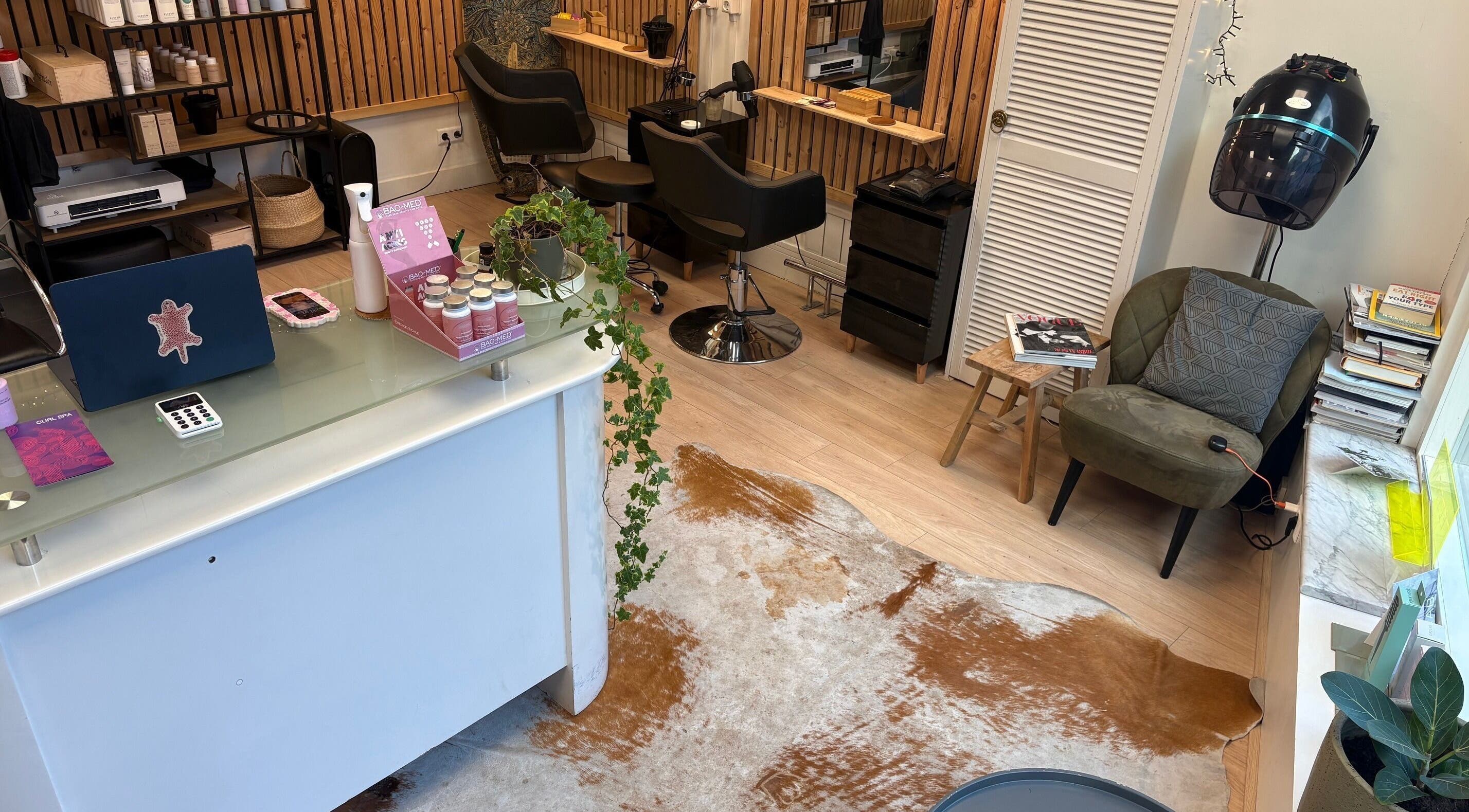 Modern interior of Curl Spa Salon The Hague, Den Haag, Zuid-holland, NL with stylish chairs and decor.