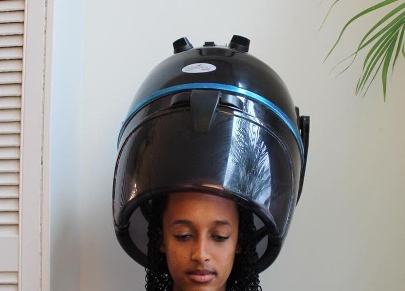 Hair treatment under dryer at Curl Spa Salon The Hague, Den Haag, Zuid-holland, NL.