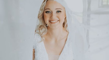 Bride glowing at Mrs Müller Bridal Studio, Pretoria, Gauteng, ZA in elegant wedding attire.