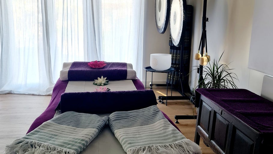 Relaxing massage table setup in THE TEMPLE ROOM, Minster On Sea, England, GB, with serene decor.