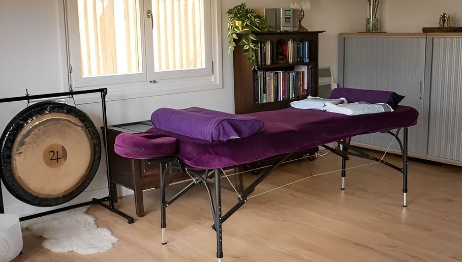Relaxing therapy room at The Temple Room featuring a massage table in Minster On Sea, England, GB.