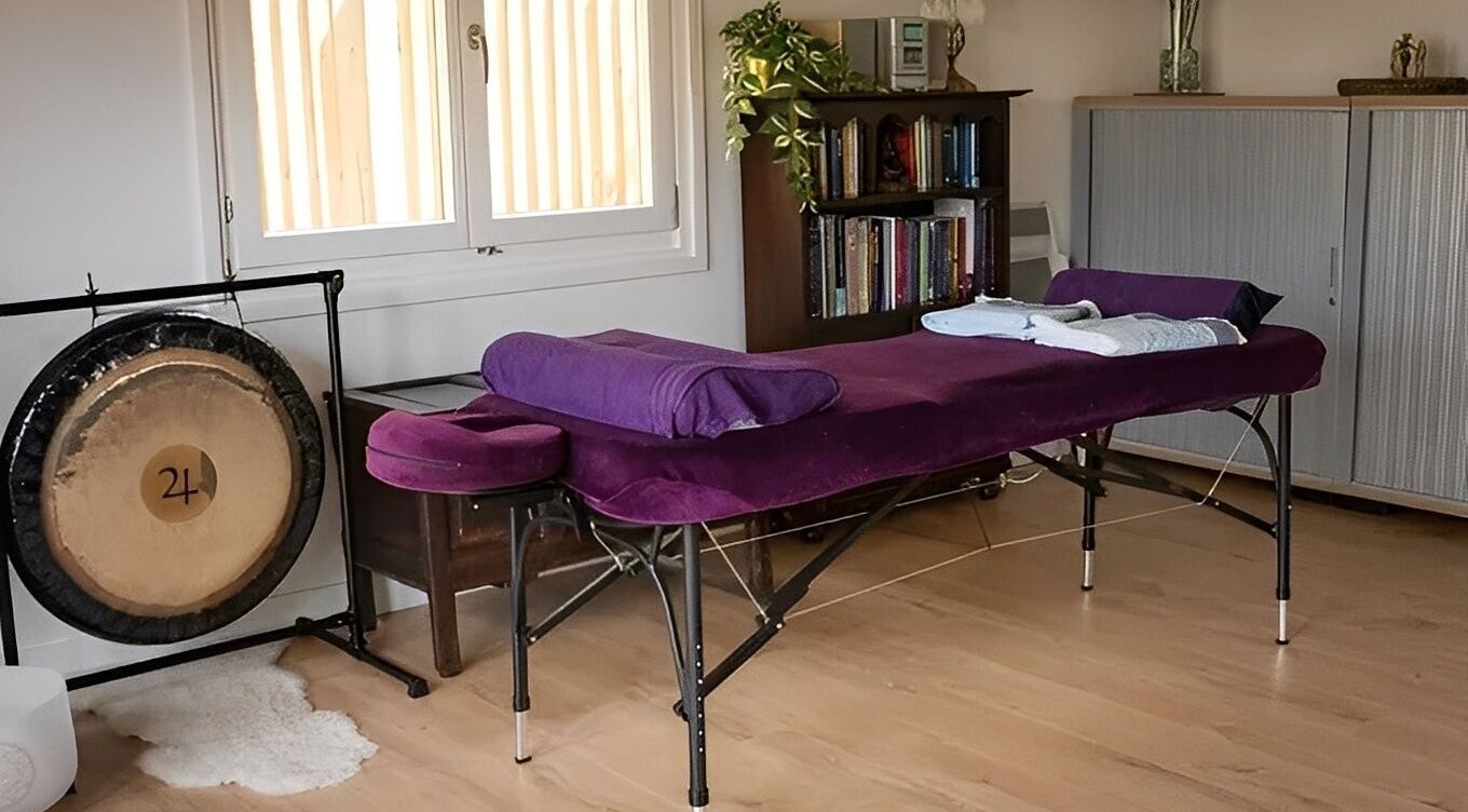 Relaxing therapy room at The Temple Room featuring a massage table in Minster On Sea, England, GB.