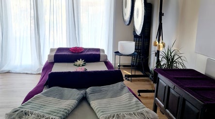 Peaceful setup in The Temple Room at Minster On Sea, England, GB with soft linens and calming decor.