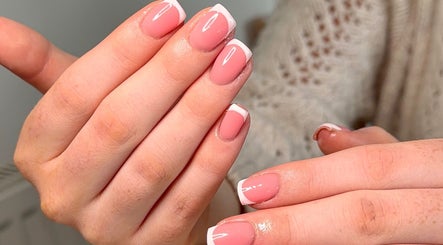 Elegant French manicure at BySorayah, Birmingham, England, GB, showcasing flawless nail design.