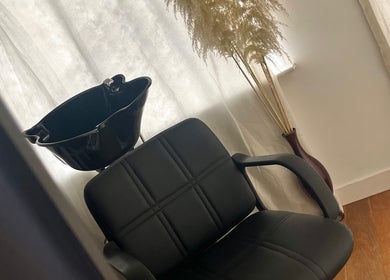 Elegant styling chair and wash basin at Sleek Hair By C, Poole, England, GB.