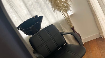 Elegant styling chair and wash basin at Sleek Hair By C, Poole, England, GB.