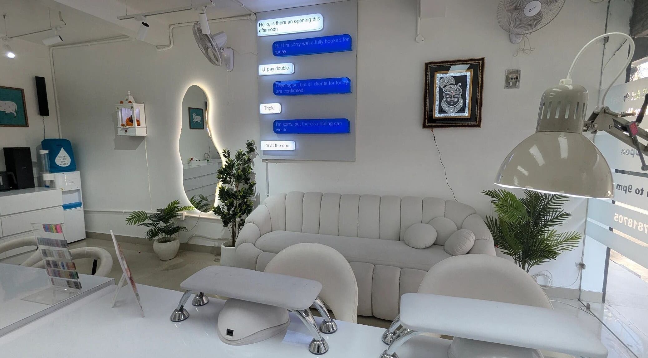 Modern beauty lounge at Shyexnails, Delhi, Delhi, IN with white decor and stylish furnishings.