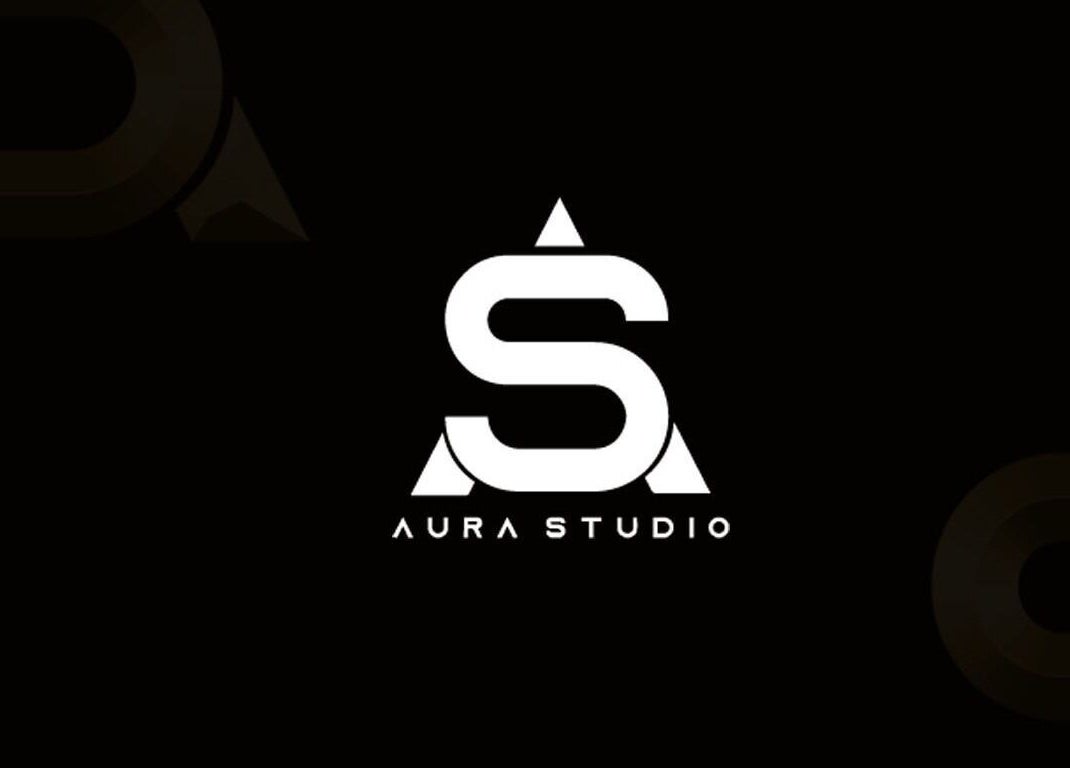 Logotipo blanco de A U R A - S T U D I O en Soacha, Cundinamarca, CO sobre fondo negro.