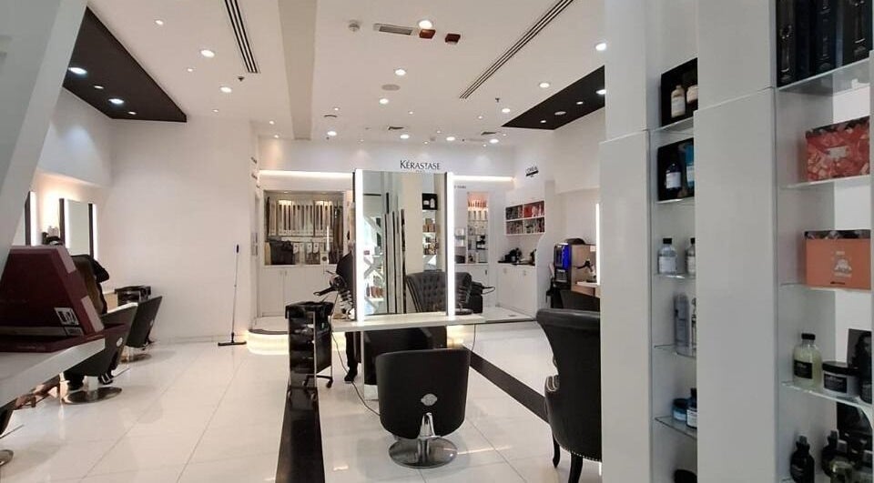 Luxurious interior of Laurance Beauty Salon in Dubai, AE featuring modern decor and styling stations.