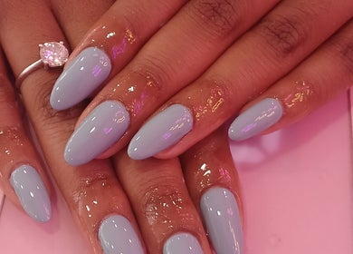 Elegant blue nails at Fresh Summer Vibes Nails in Cape Town, Western Cape, ZA with a sparkling ring.