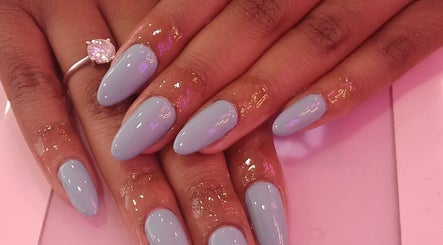 Elegant blue nails at Fresh Summer Vibes Nails in Cape Town, Western Cape, ZA with a sparkling ring.