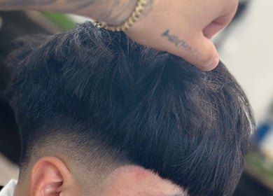 Detailed short fade haircut at Air Studio, Mendoza, Mendoza, AR showcasing expert grooming skills.